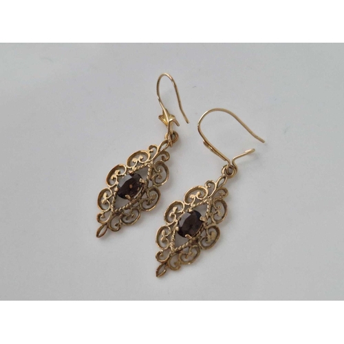 553 - A pair of fancy stone set drop earrings, 9ct, 2.1 g.