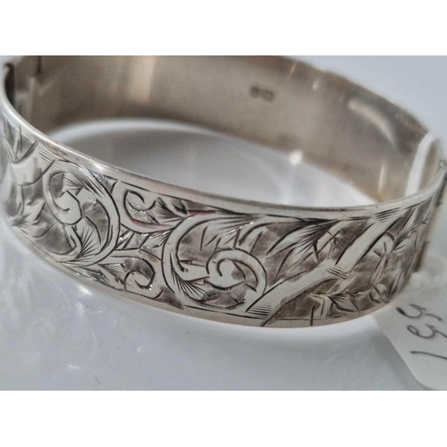 557 - A silver bangle, 22 g