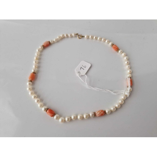 76 - A pearl and coral necklace with 9ct clasp 15 inch