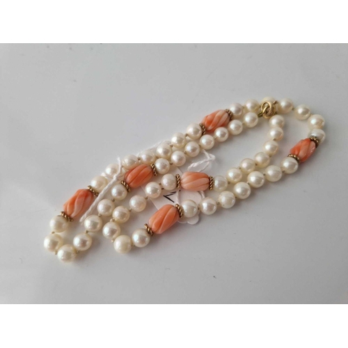 76 - A pearl and coral necklace with 9ct clasp 15 inch