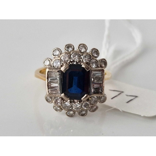 77 - A LARGE SAPPHIRE AND BAGUETTE DIAMOND RING 18CT GOLD SIZE Q 5.4 GMS