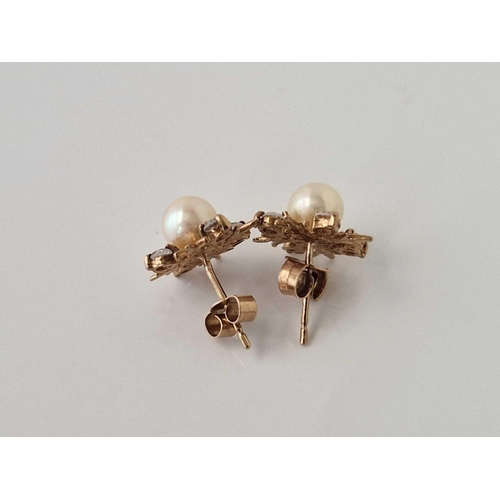 89 - A pair of pearl earrings, 9ct