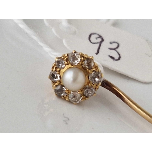 93 - A gold pearl and diamond topped stick pin, 2.9 g.