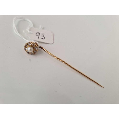 93 - A gold pearl and diamond topped stick pin, 2.9 g.