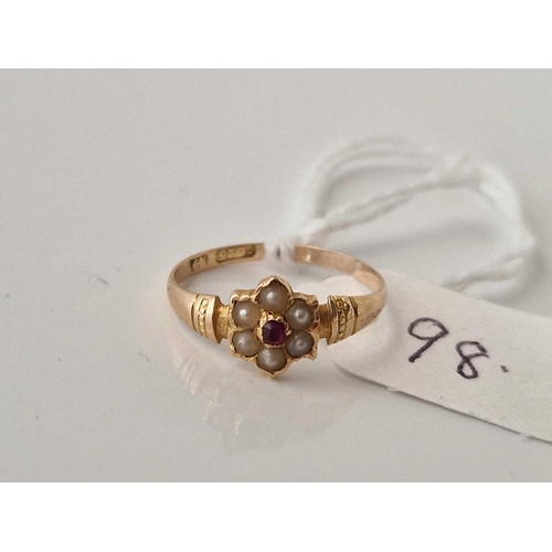 98 - A antique ring with ruby and pearls, 15ct, size J