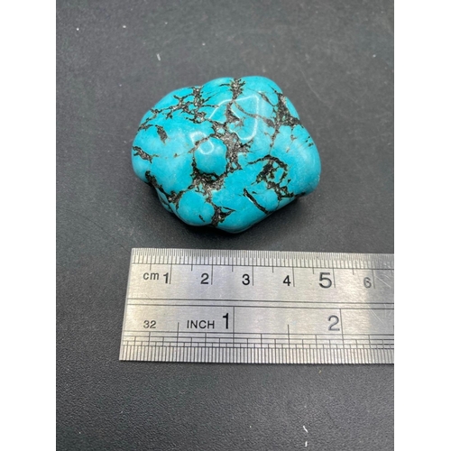 113 - A very large fine turquoise matrix polished gem stone 225 carats