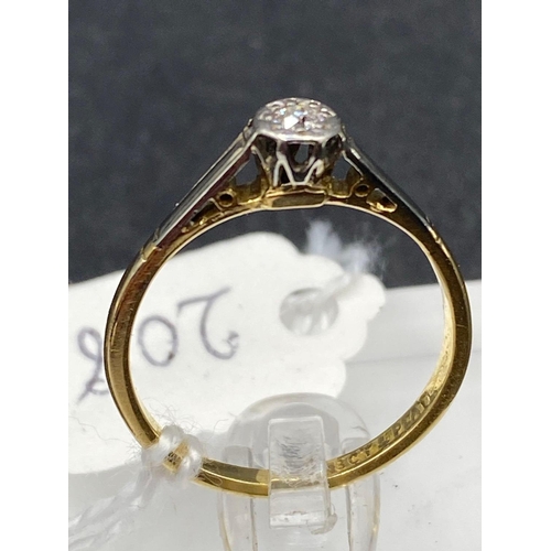 208 - A 18ct gold and platinum diamond ring size P 2.6 gms