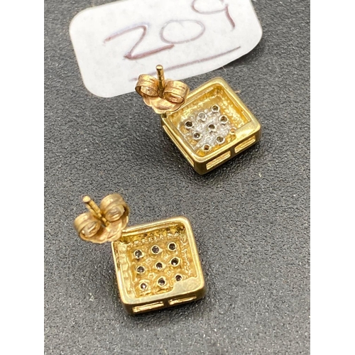 209 - A pair of diamond square set earrings 9ct 2 gms