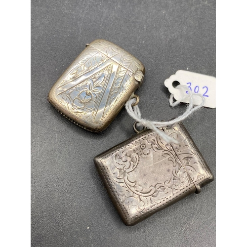 302 - Two silver vesta cases