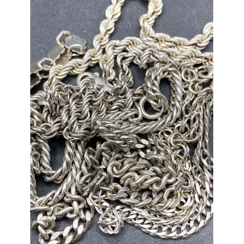 306 - Seven silver link bracelets 39g