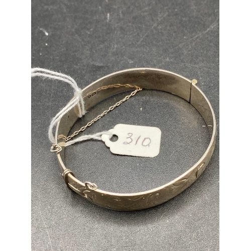 310 - A wide silver bangle