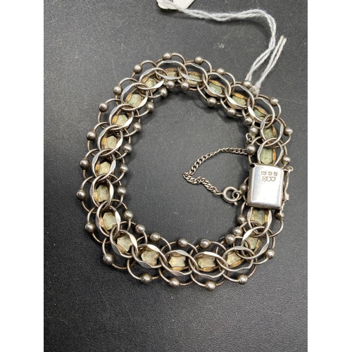 362 - A silver heart link bracelet