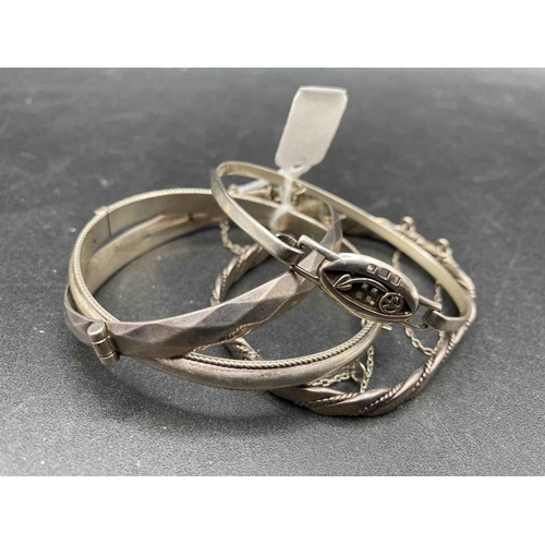 363 - Four silver bangles