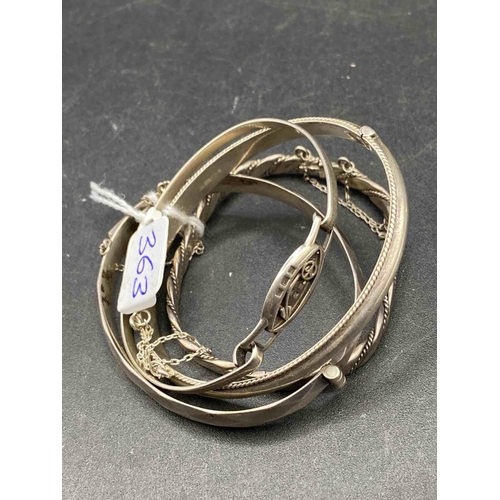 363 - Four silver bangles