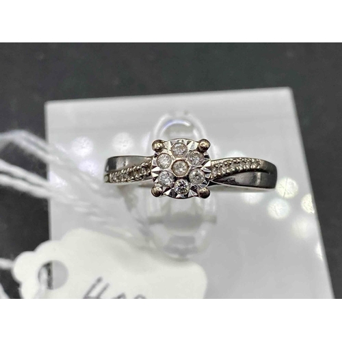 402 - A white gold and diamond ring 9ct size P 2.7 gms