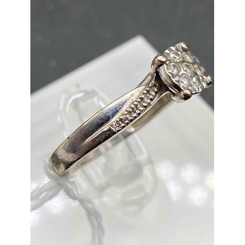 402 - A white gold and diamond ring 9ct size P 2.7 gms