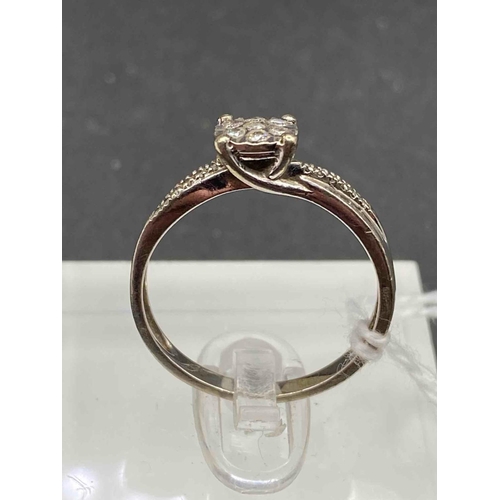 402 - A white gold and diamond ring 9ct size P 2.7 gms