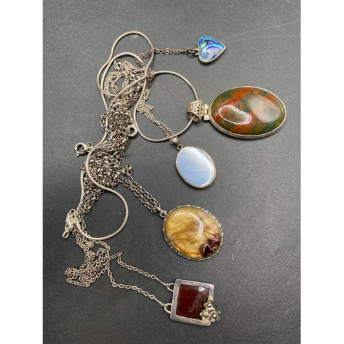 432 - Five silver necklaces with hard stone pendants