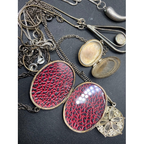 434 - Five silver pendant, necklaces and lockets