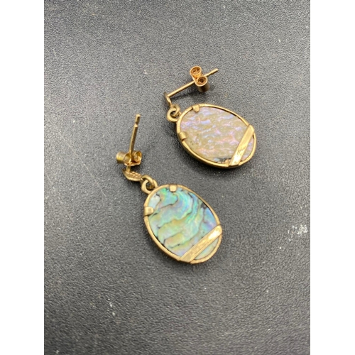 502 - A pair of opal set dolphin drop earrings 9ct 3 gms