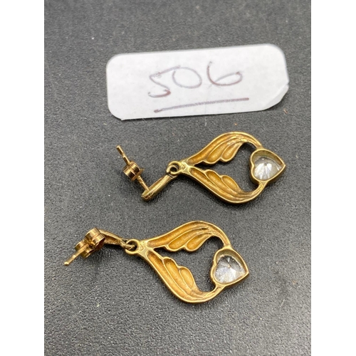 506 - A pair of gold drop earrings with heart shaped stones 9ct 2.4 gms