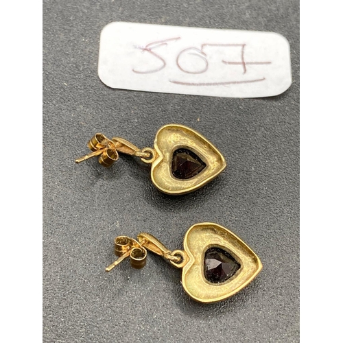 507 - A pair of heart shaped stone set earrings 9ct 2.2 gms