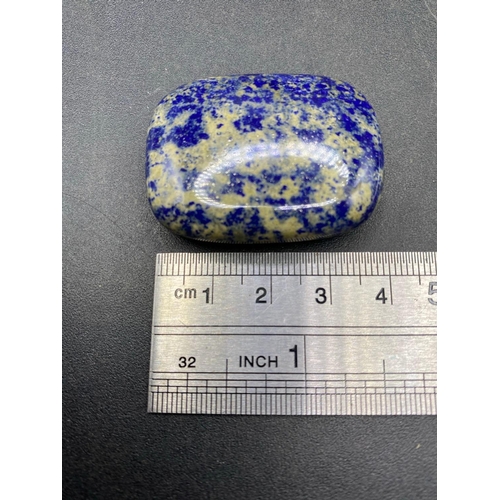 518 - A lapis gem stone paper weight 140 carats