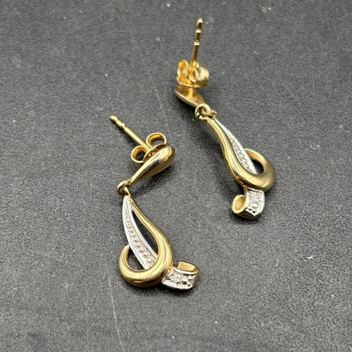 407 - A pair of diamond drop earrings 9ct 2.2 gms