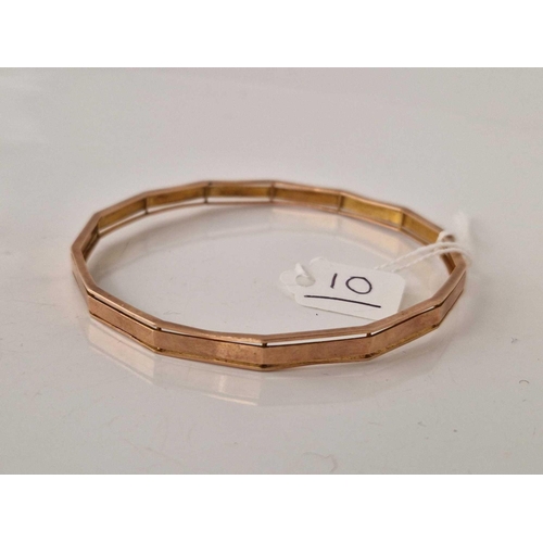 10 - A WIDE GOLD BANGLE 9CT 13.4 GMS