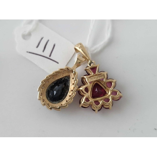 111 - Two gem stone pendants 14ct gold