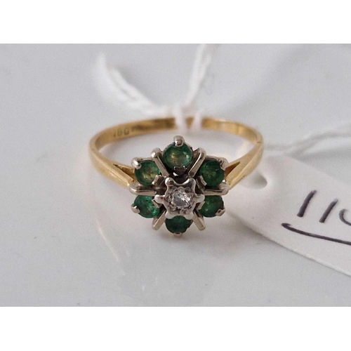 114 - A emerald and diamond cluster ring 18ct gold size O