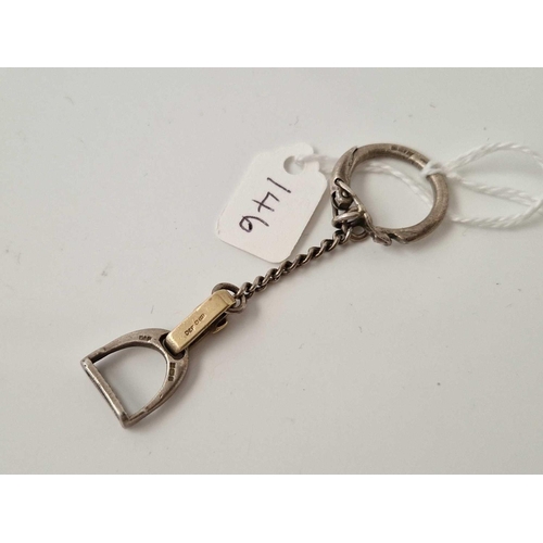 146 - A 9ct and silver stirrup key ring