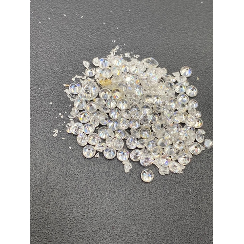 157 - A bag of clear gem stones ex jewellers