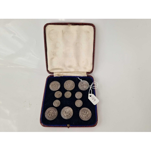 159 - A good cased set of six large silver naval buttons and five smaller examples boxed