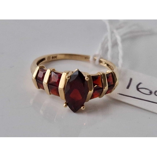 164 - A five stone garnet ring, 14ct, 3.2 g.