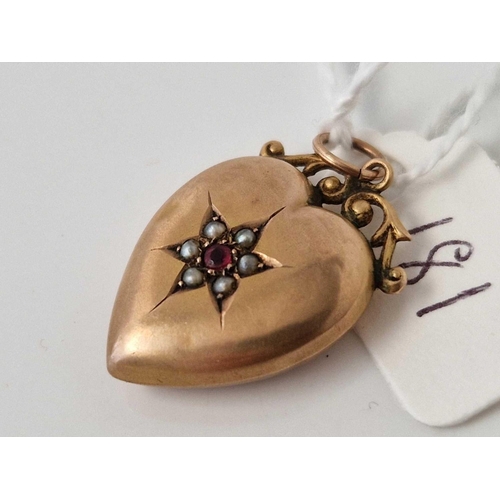 181 - A heart locket with pearl and ruby 9ct