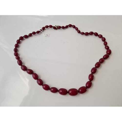 191 - A row of cherry red beads