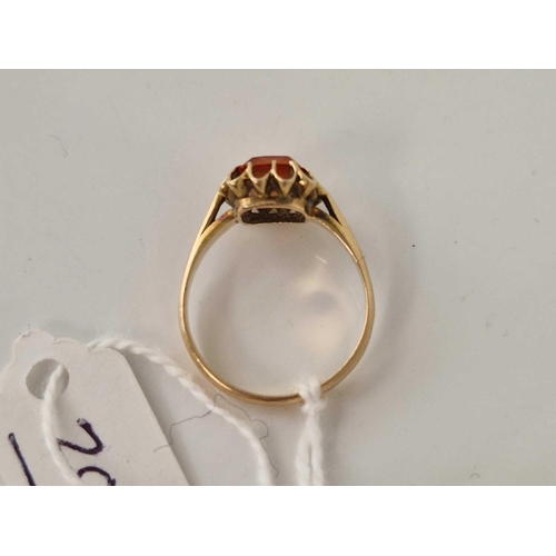 20 - A orange stone ring14ct gold size N 2.5 gms