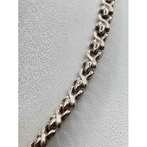 201 - A solid silver fancy link neck chain 15 inch