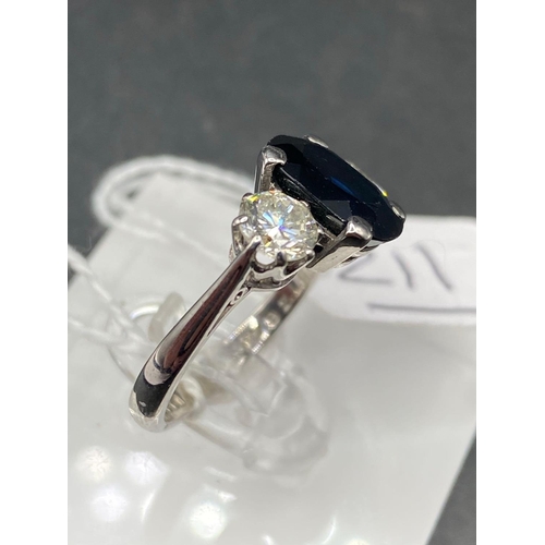 211 - A IMPRESSIVE DIAMOND AND SAPPHIRE THREE STONE RING 18CT WHITE GOLD SAPPHIRE 10MM X 8 MM TWO DIAMONDS... 