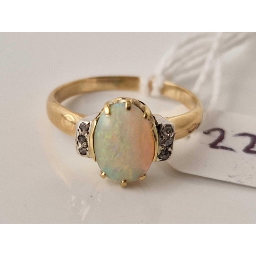 227 - A antique single stone opal ring with diamond set shoulders 18ct gold size O 3.2 gms