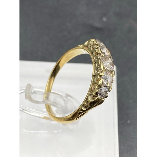 244 - A VICTORIAN FIVE STONE DIAMOND GRADUATED RING IN HAND CARVED MOUNT 18CT GOLD SIZE P 3.2 GMS