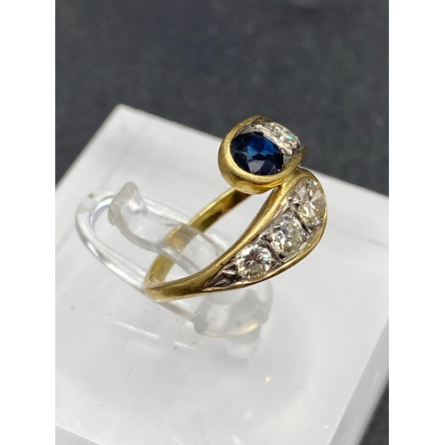 246 - A CONTEMPORARY DOUBLE HEADED SNAKE SHAPED RING SET WITH FINE DIAMONDS AND SAPPHIRE 18CT GOLD SIZE I ... 