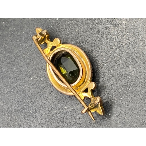 248 - A Victorian green tourmaline and pearl brooch 15ct gold