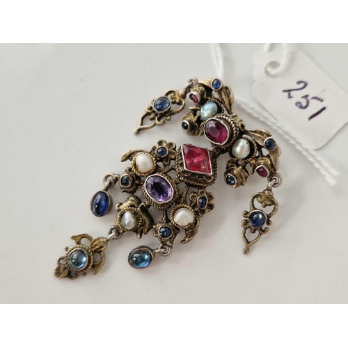 251 - A 19th century Austro Hungarian silver pendant brooch set with pearls amethysts garnet and sapphire