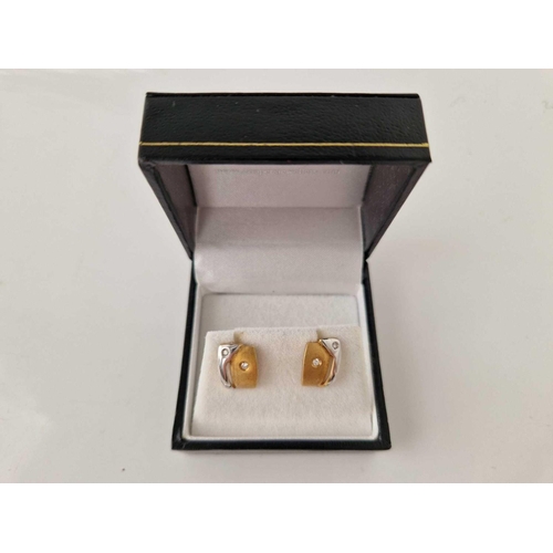 263 - A pair of two colour gold and diamond earrings 18ct gold 2.2 gms