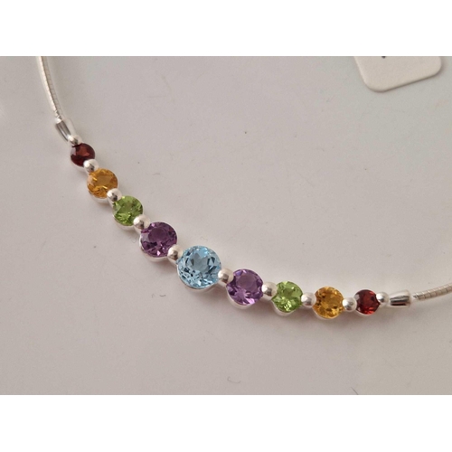 282 - A silver gem stone set necklace 14 inch