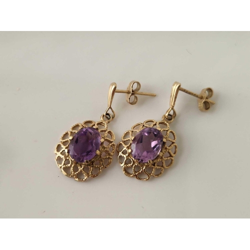 285 - A pair of amethyst earrings 10mm size stone 3.1 gms