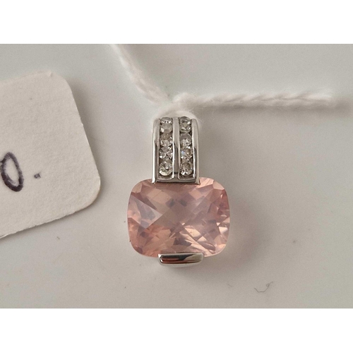 290 - A white gold diamond and pink stone pendant