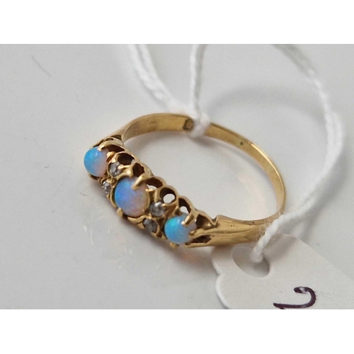 294 - A opal and diamond ring 18ct gold size O 2.3 gms